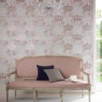 shot of pale pink sofa with graham and brown wallpaper in gold and pink crown pattern