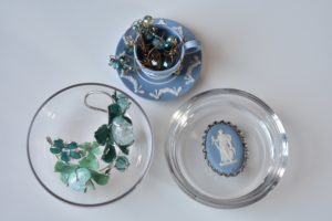 Jewellry in glass storage cased from Ikea and vintage wedgewood tea cup.