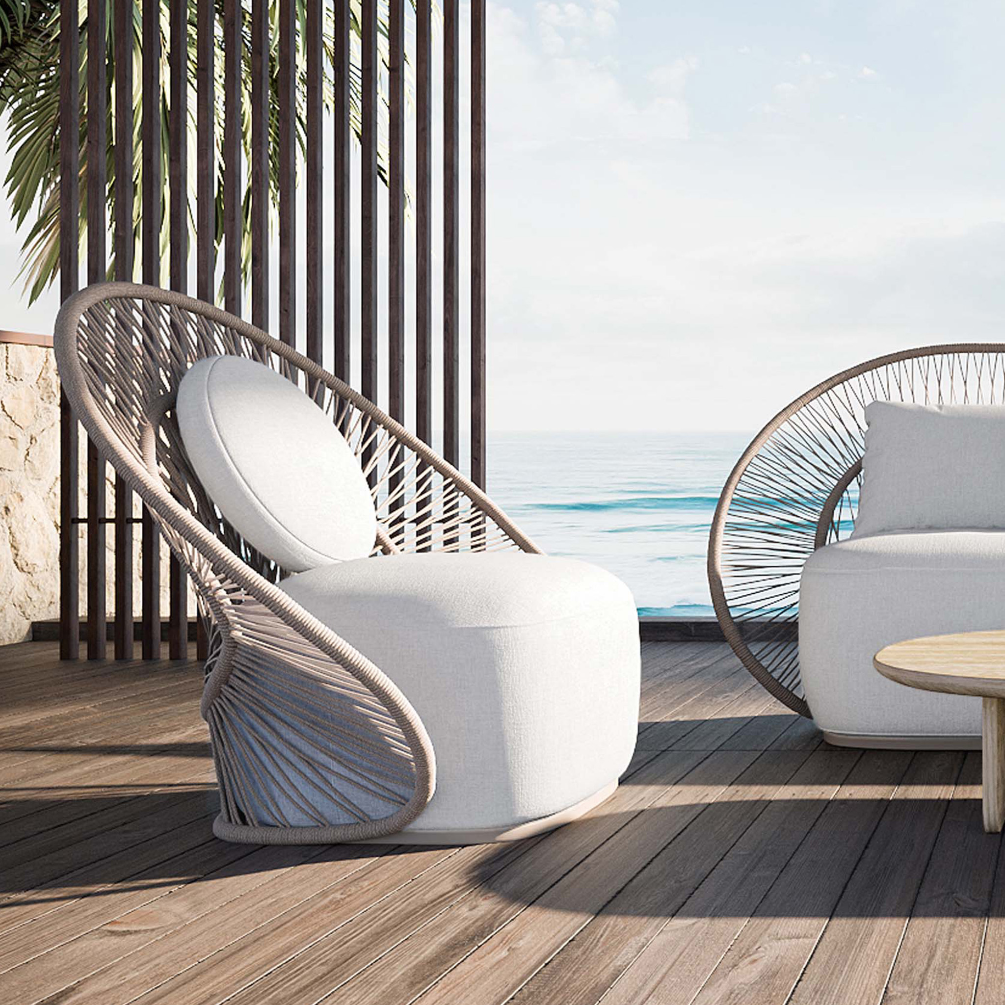 Seaside deck with furniture Sofa from Marcel Wanders studio Maui Collection for Harbour for all season use