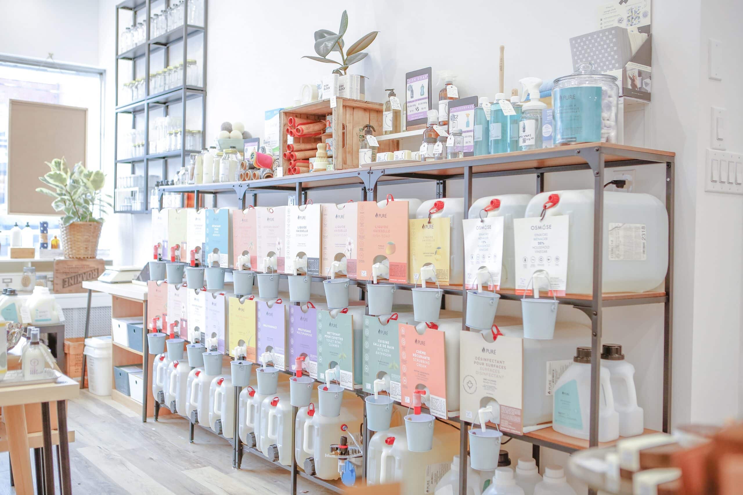 Display of lines of large jugs in The Keep Refillery, a Toronto store that sells personal care and home products in refillable containers to reduce their carbon footprint and packaging waste.